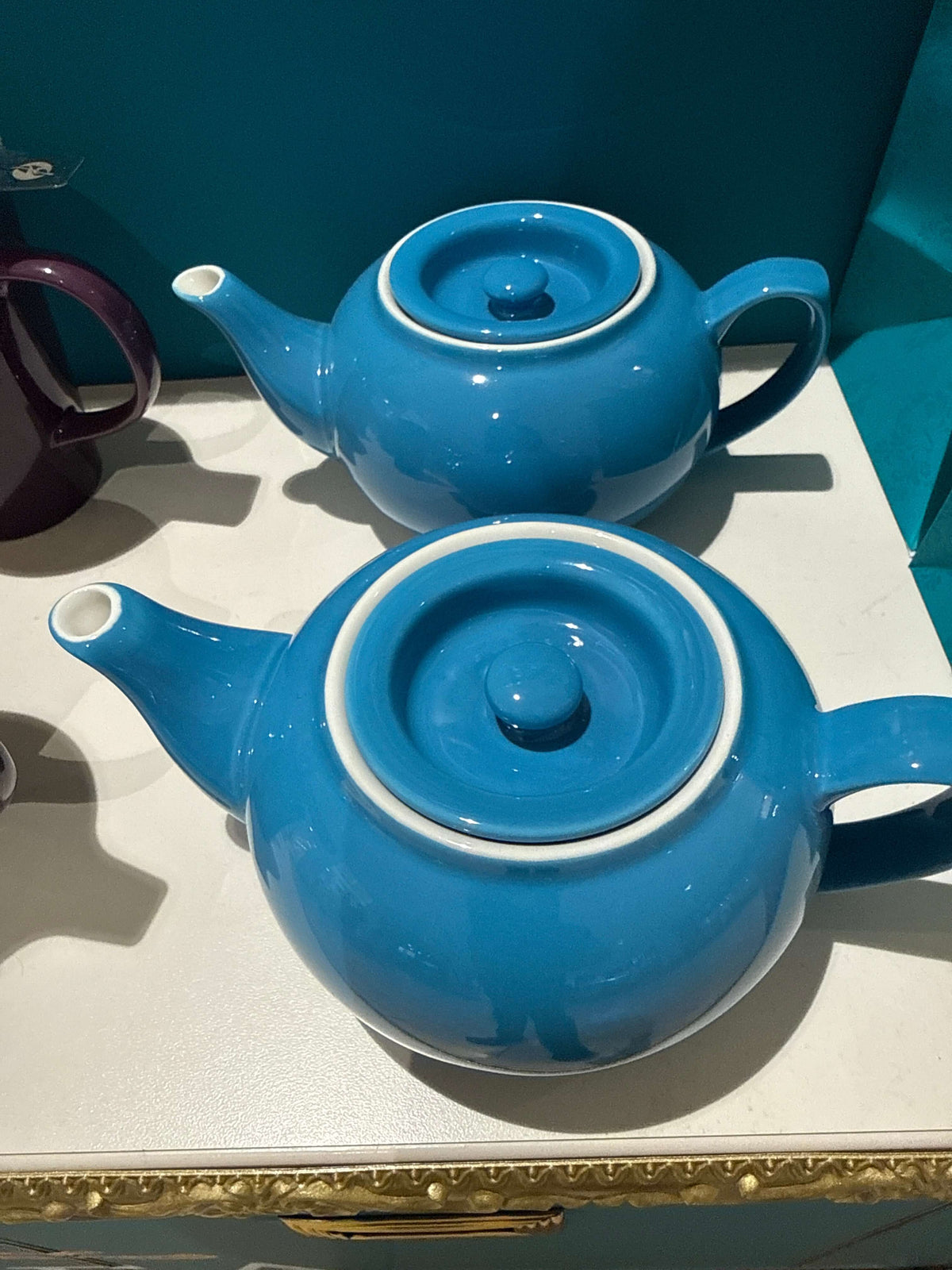 Tea pot with infused ceramic blue