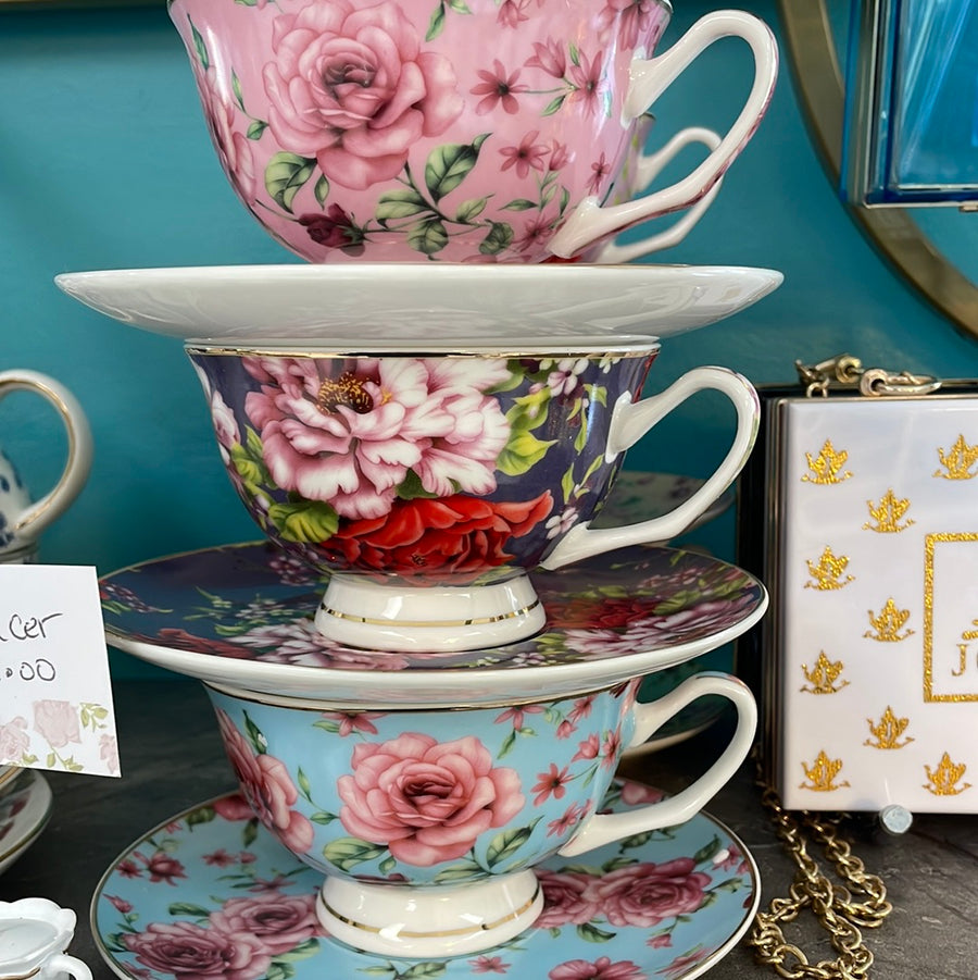 Floral Tea Cups and white Tea cups and Saucers
