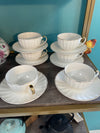 Floral Tea Cups and white Tea cups and Saucers
